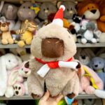 М'яка іграшка ведмедя в шапці Санти