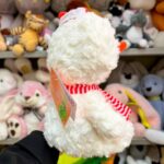 М'яка іграшка у формі птаха з шарфом