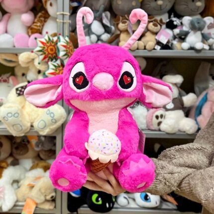 Плюшевий рожевий монстр з морозивом